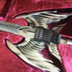 Illustration for article titled Angel Sword Guitar Plays Iron Maiden Songs, Slays Teen Pop Stars